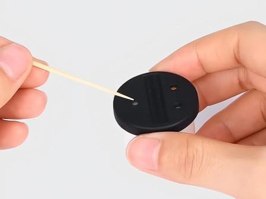 Poking open the holes in the MM01 lure with a toothpick